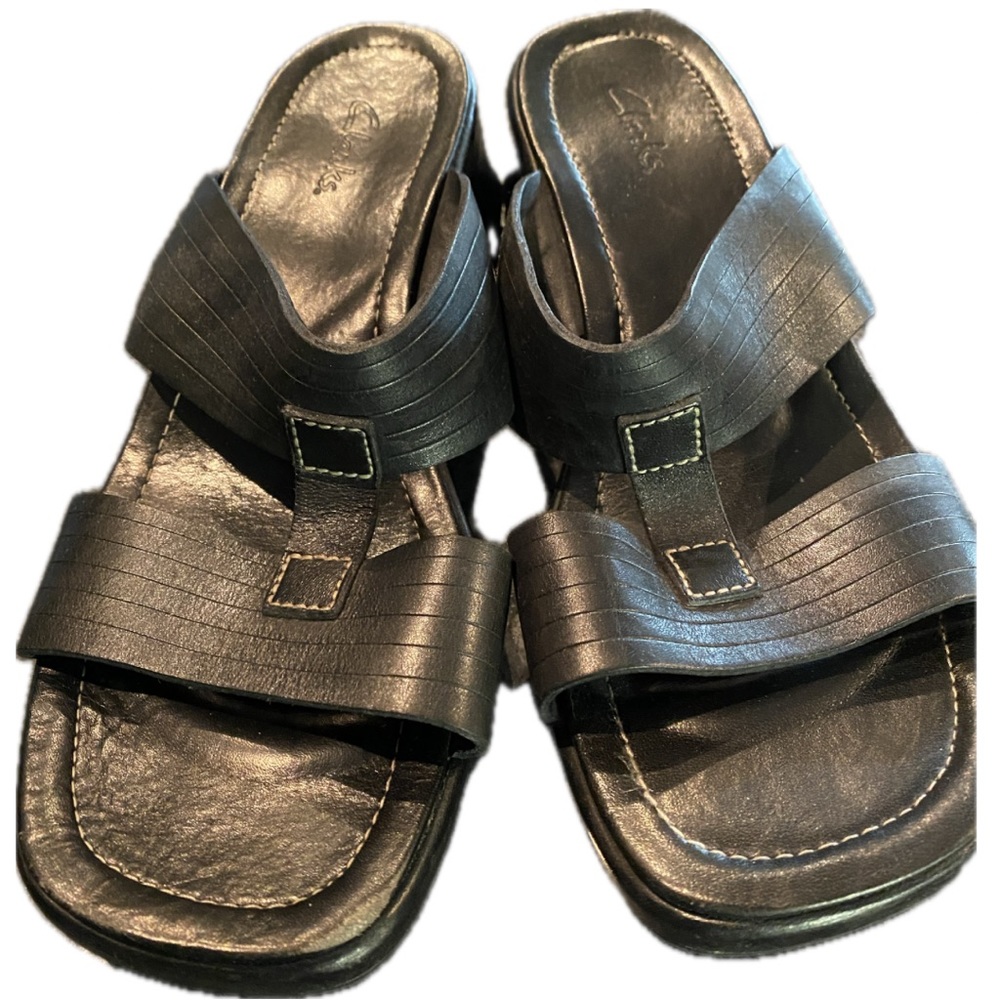 Clark’s black sandals, size 8.5, good used condition, small scuff on right toe.